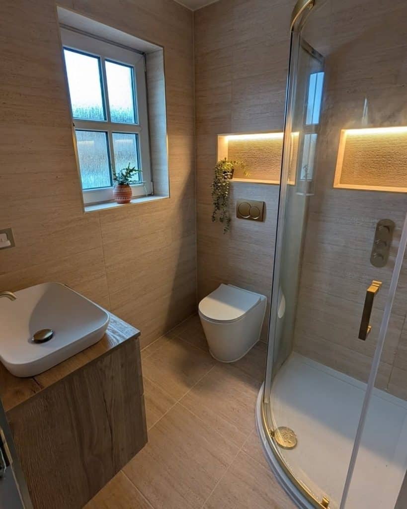 Small en-suite in Paisley with wall-hung oak vanity, vessel basin and quadrant shower enclosure